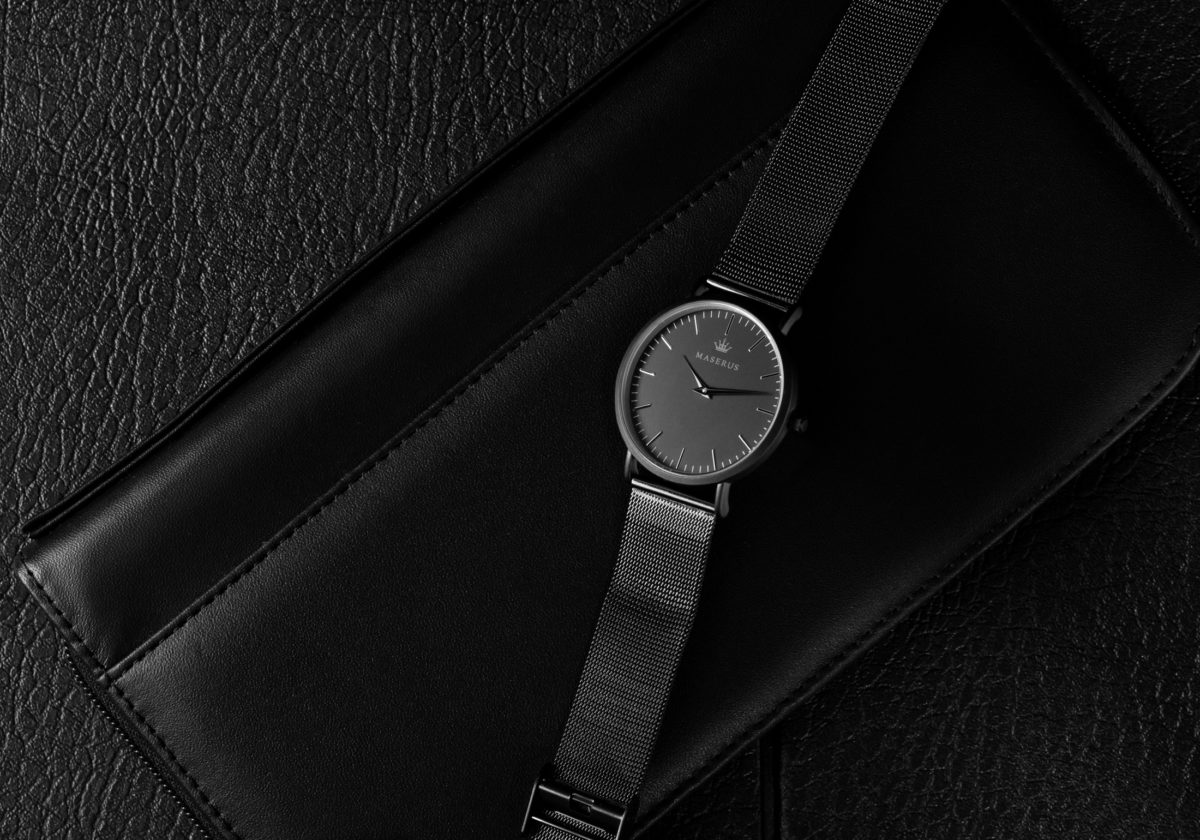 Product image three of mens black mesh watch on leather case.